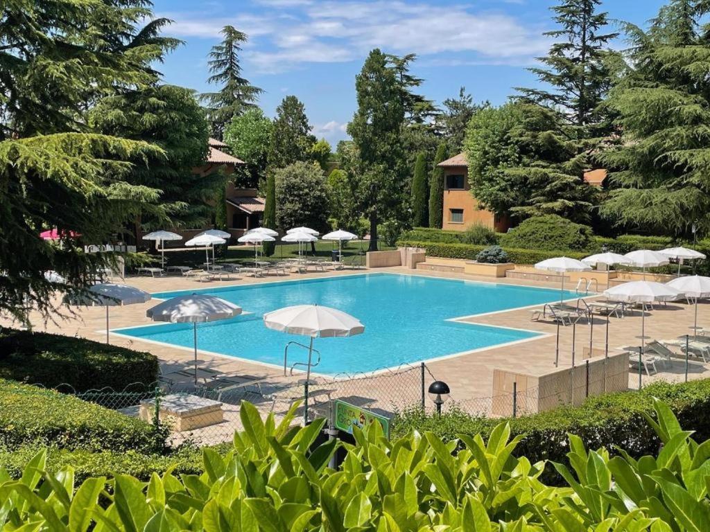 Casa Vittoria Sirmione Punta Gro Con Piscina Apartment Bagian luar foto